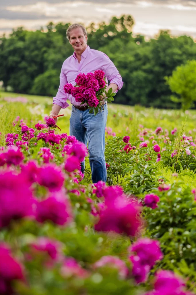 P. Allen Smith in the peony field at Gilbert H. Wild.